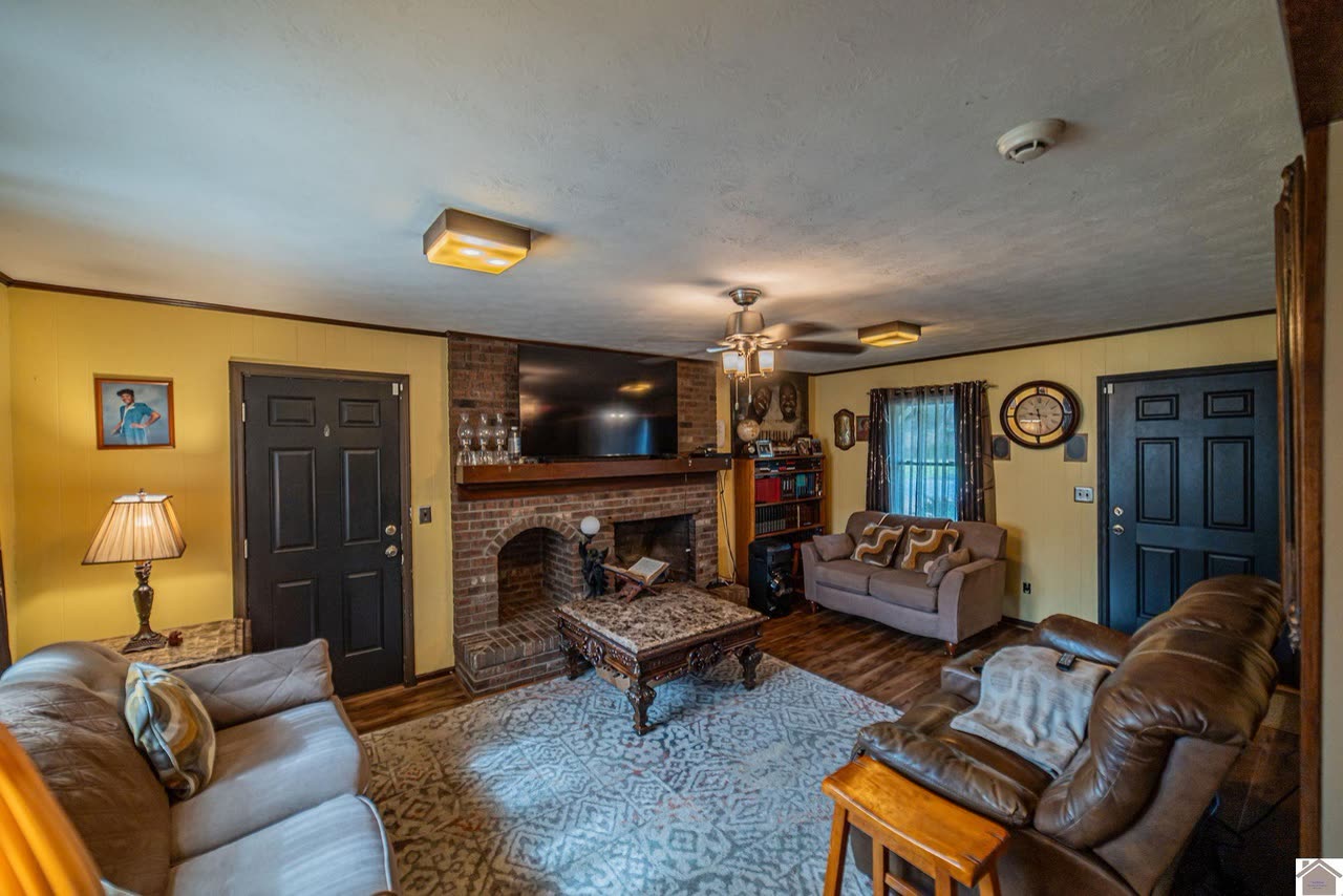 Family room with brick fireplace
